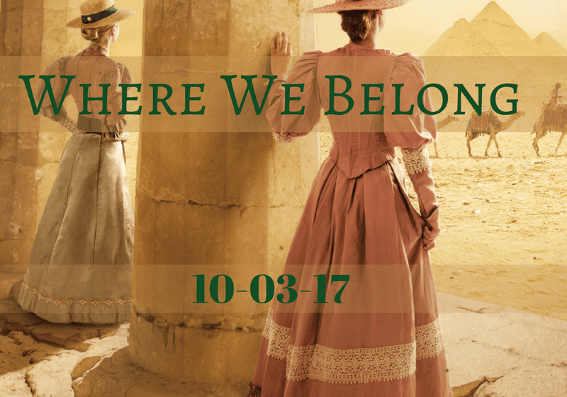 Women in period dresses near Egyptian pyramids