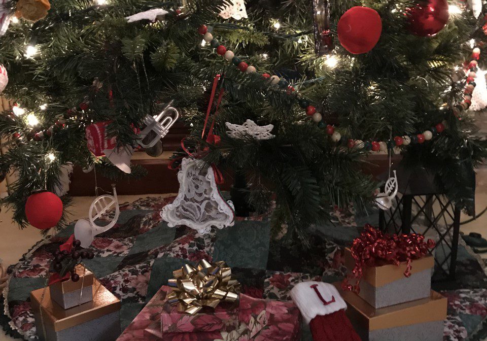 Decorated Christmas tree with gifts underneath